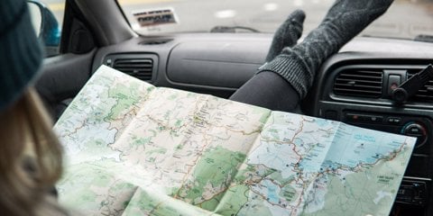 Passenger looking at map of Ruapehu - Visit Ruapehu.jpg
